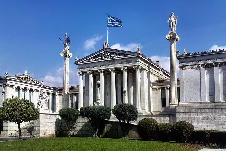 Athens Academy building with Greek flag, landmark arrival on private transfer from Kalabaka Meteora to Athens