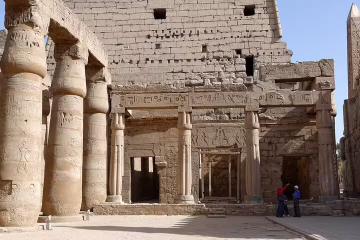 Karnak Temple columns and hieroglyphs in Luxor on a day tour by plane from Sharm El Sheikh, Egypt