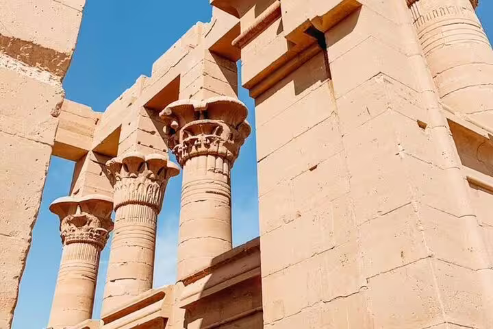 Sunlit columns and pylons at Karnak Temple, visited on a full-day private guided Luxor tour from Safaga
