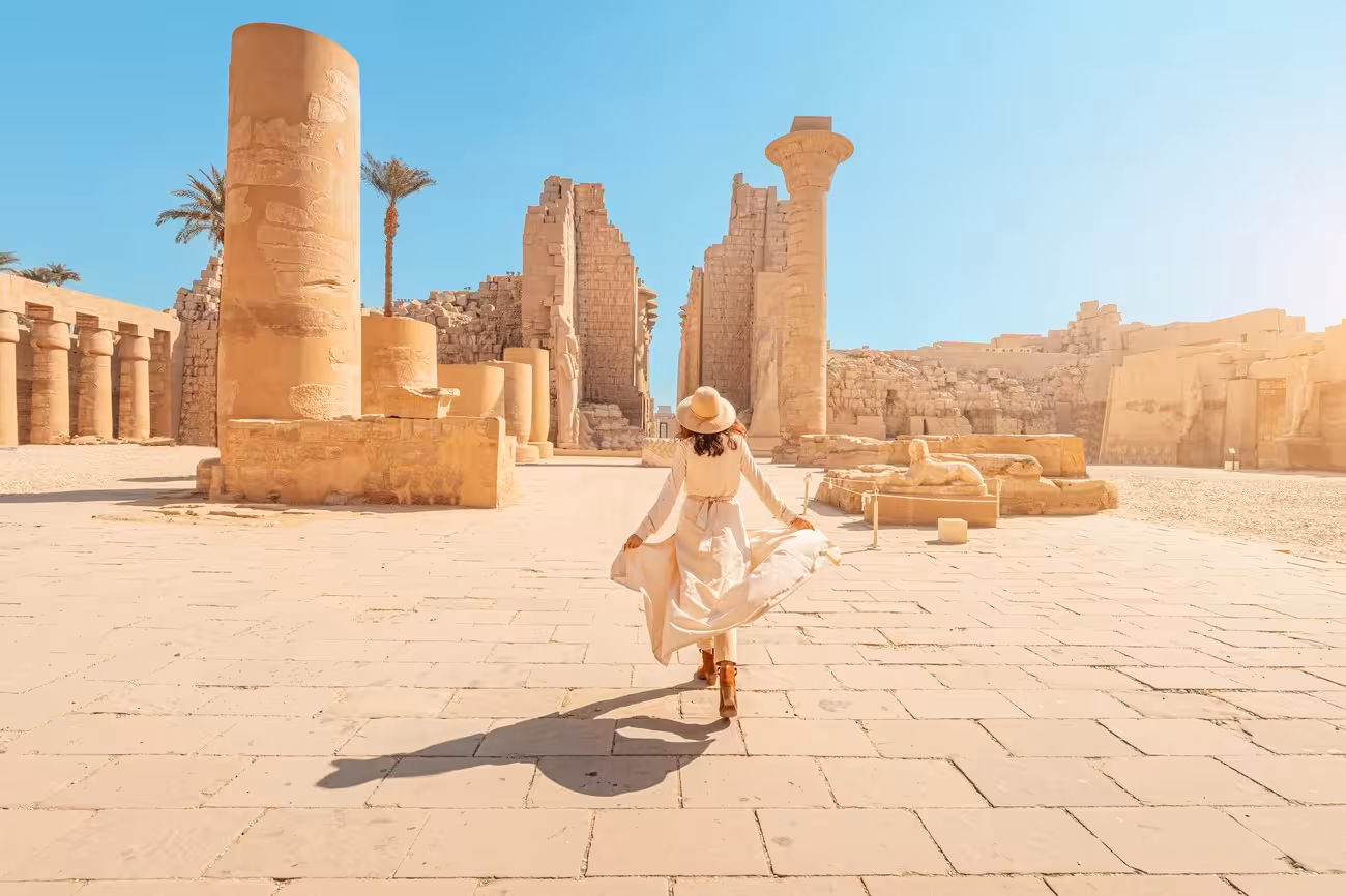 Traveler at Karnak Temple in Luxor on 11-day budget Egypt tour with entrance fees and tipping included