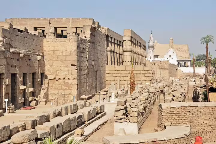 Ancient Karnak Temple ruins and walls in Luxor, featured on historical day tour by plane from Sharm El Sheikh