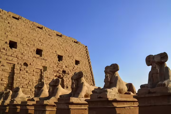 Karnak Temple ram-headed sphinx avenue in Luxor, visited on a private full-day tour from Aswan by car