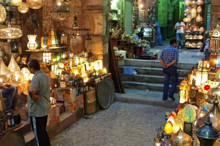 Lantern shops glowing in Khan El Khalili Bazaar alley, classic stop on a private Old Cairo guided tour Cairo