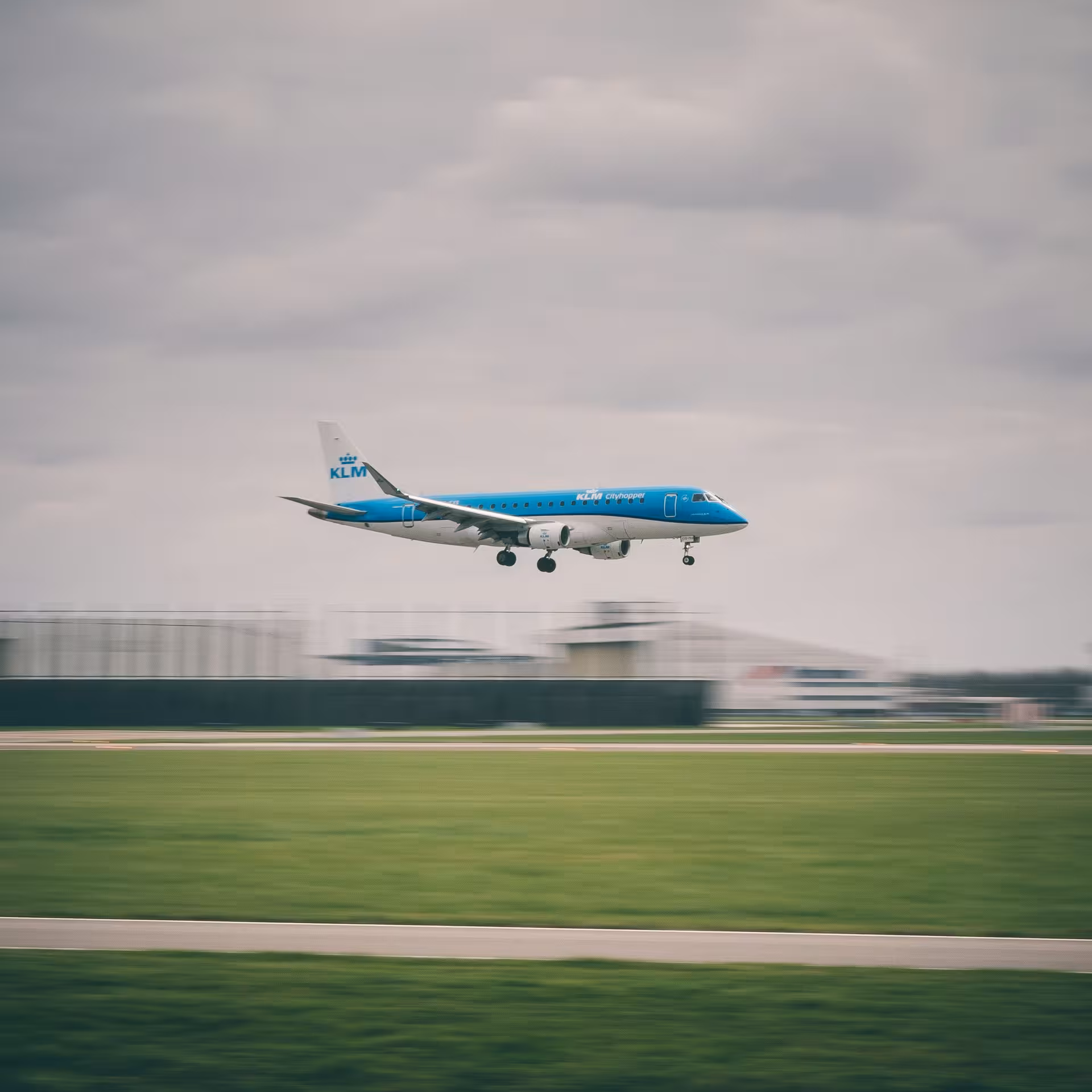 KLM plane landing at Schiphol Airport, start point for an Amsterdam private layover tour 3h 4h or 5h