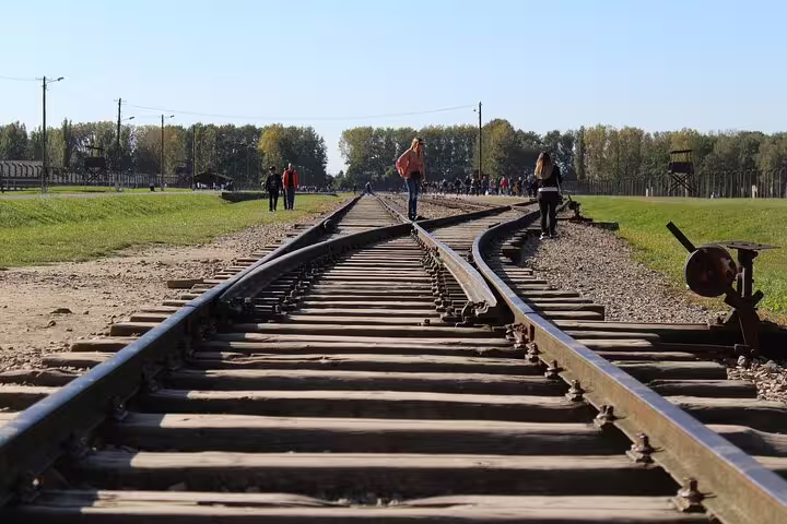 Railway tracks at Auschwitz-Birkenau memorial site visited on a Krakow private round-trip experience with guide