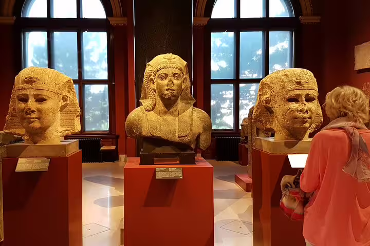 Explore ancient Egyptian sculptures during a private tour at the Kunsthistorisches Museum, showcasing historical artistry.