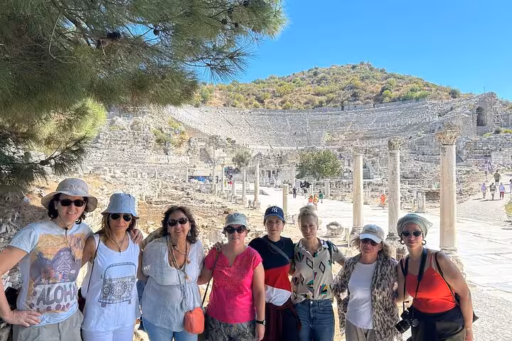 Small group at Ephesus ancient theater near Kusadasi Port on guided shore excursion tour in Turkey