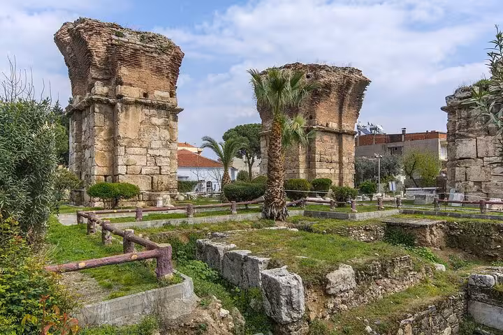 Laodicea archaeological site with ancient brick towers and palms, private Seven Churches tour Turkey