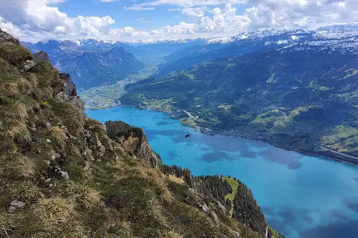 Steep Leistkamm Ridge trail above Walensee with dramatic Swiss Alps scenery on a guided hiking tour from Zurich