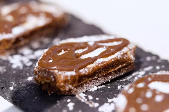 Portuguese dessert bites with caramel drizzle, a sweet stop on the Lisbon vintage jeep tour with drinks
