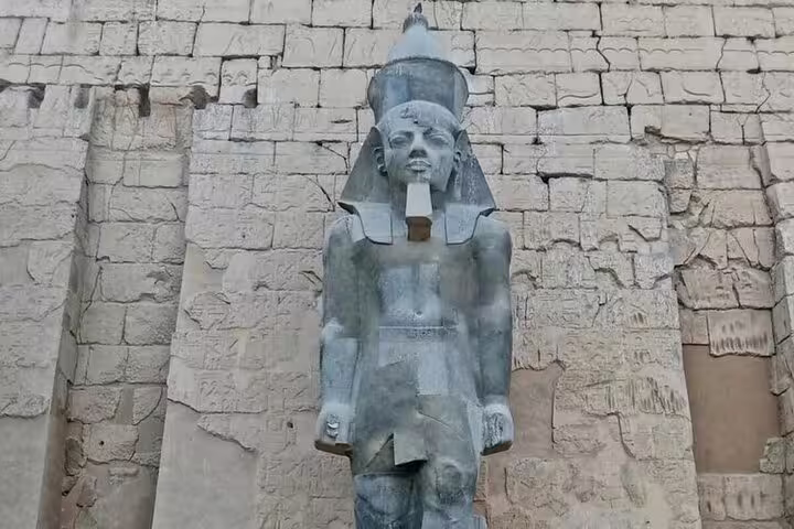 Colossal statue at Luxor Temple on a private full-day guided tour from Safaga Port to Luxor