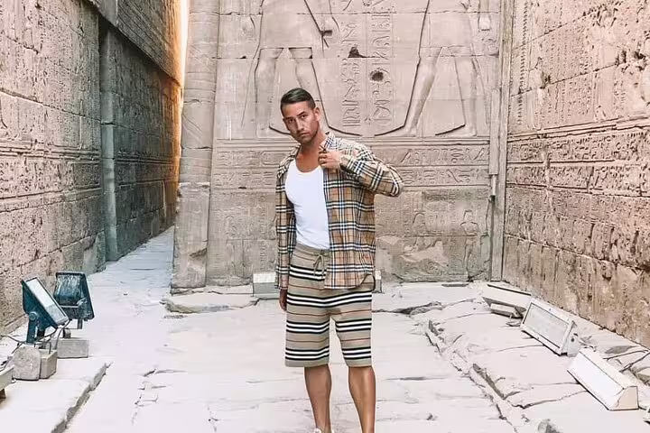 Tourist posing by ancient hieroglyph walls in Luxor temple complex, Cairo to Luxor sleeper train 3D2N trip