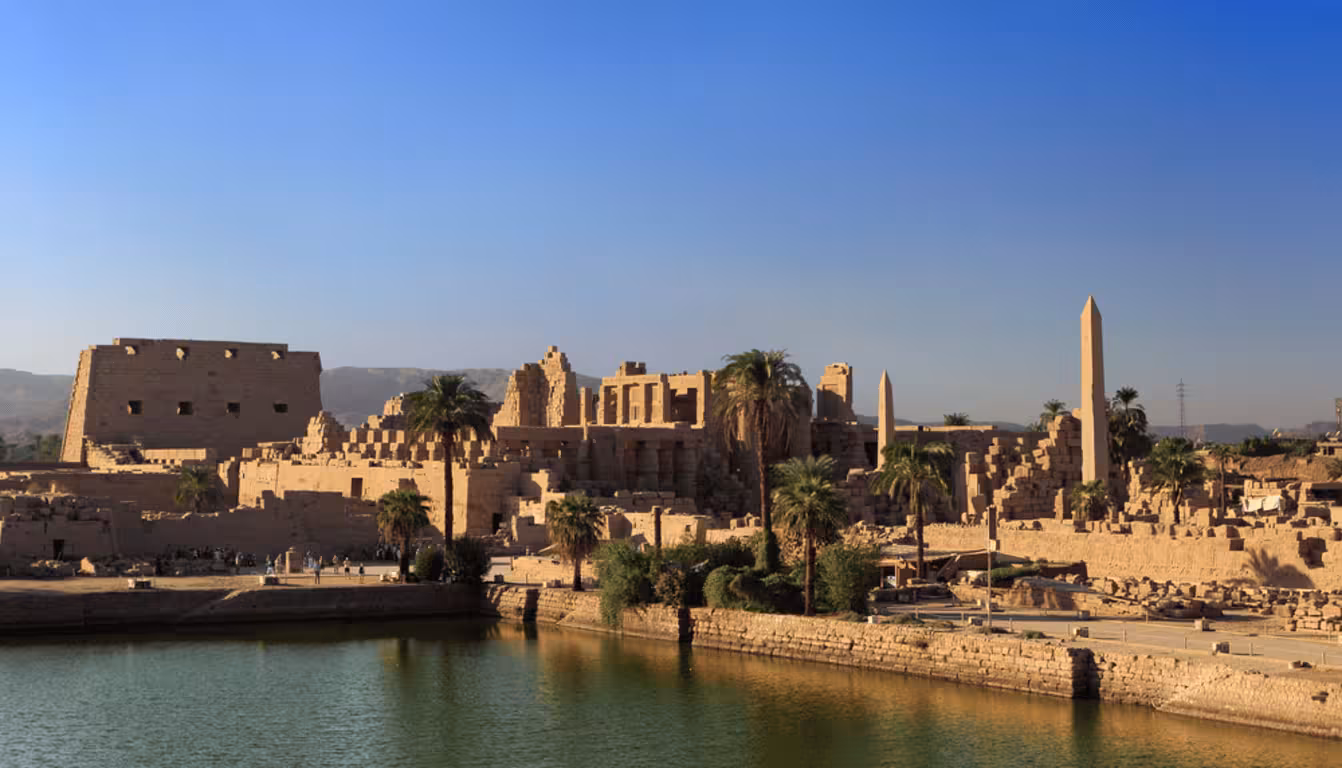 Luxor Temple and Nile River view at sunset, key stop on 8-day budget Egypt tour Cairo to Aswan Abu Simbel