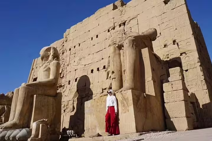 Colossal statues at Luxor Temple complex, highlight of 15-day 14-night Egypt tour to Pyramids, Luxor and Aswan