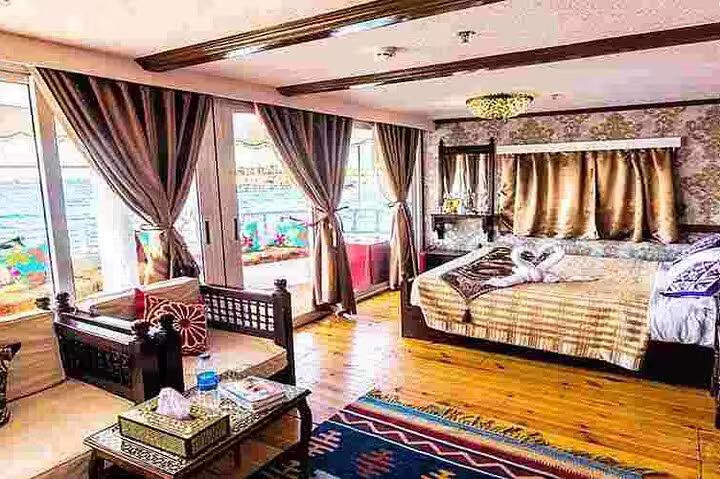 Luxury cabin suite on VIP Dahabiya Nile cruise Luxor to Aswan, 4 nights 5 days with river-view windows