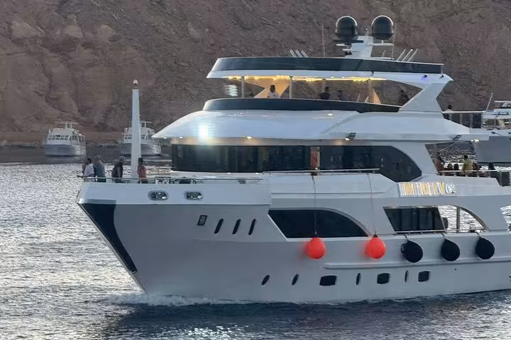 Luxury dinner cruise yacht in Sharm El Sheikh marina, ideal for evening oriental buffet and belly dance show