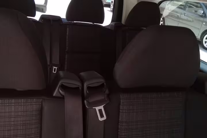 Spacious rear seats inside luxury limousine for Athens Airport to Syntagma Square private transfer
