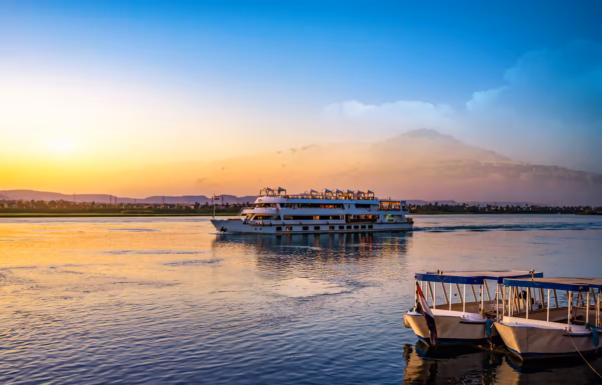 Luxury Nile River cruise ship at sunset, part of the 8-day Cairo to Abu Simbel journey through ancient Egypt