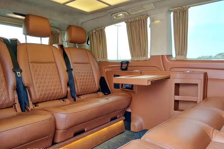 Luxury van interior with leather seats for private Istanbul to Bursa tour, spacious ride and onboard table