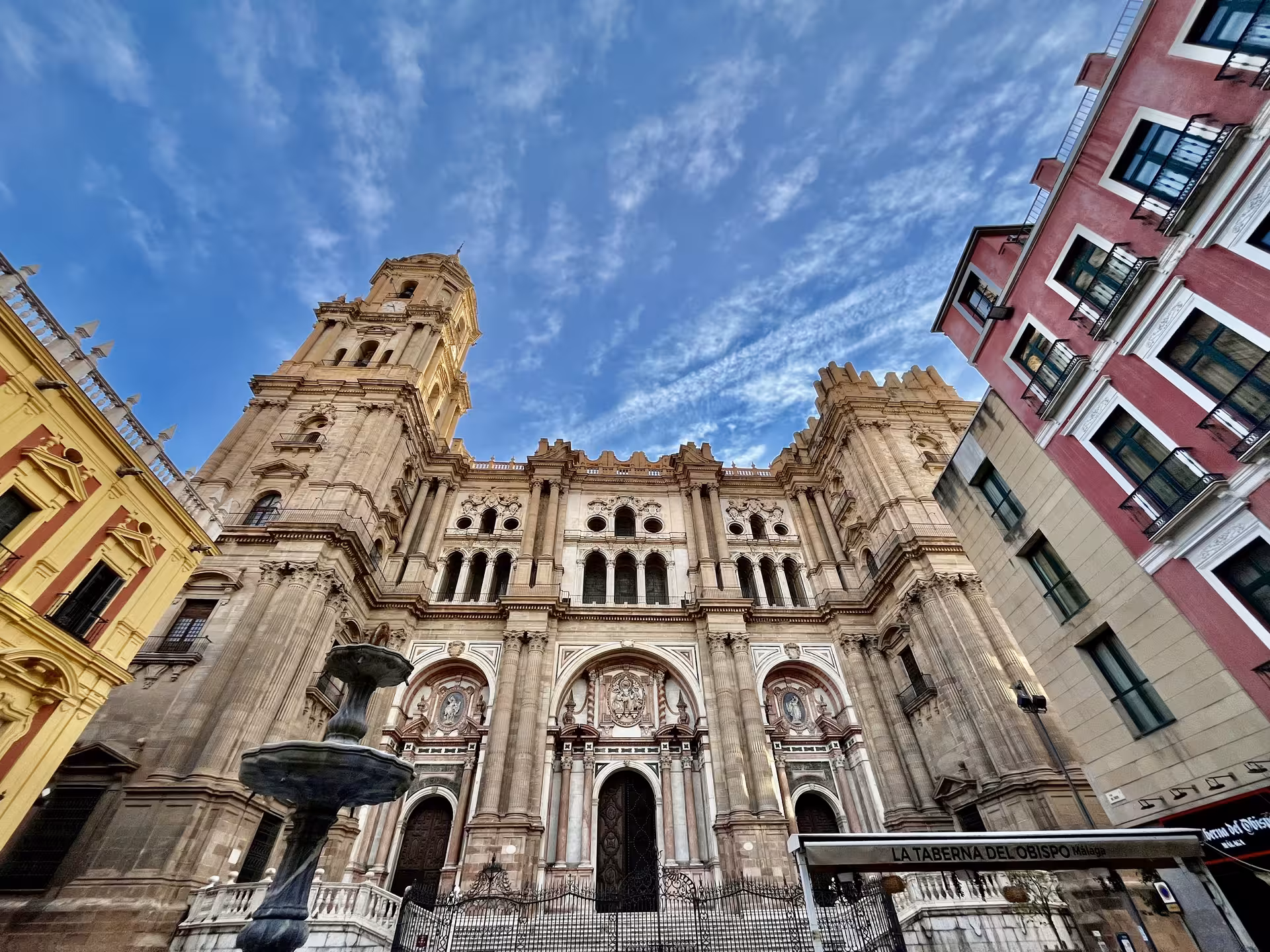 Málaga Cathedral facade and plaza view, a key stop near Casa Natal and Museo Picasso local museums tour