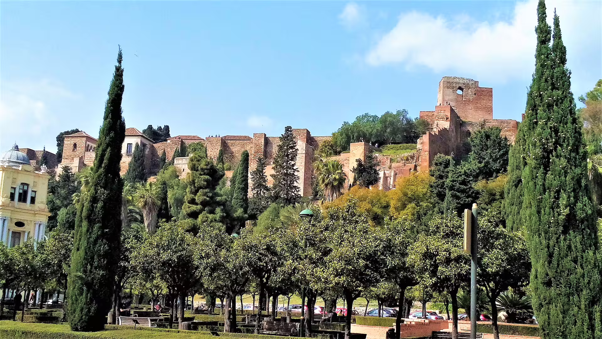 Malaga private full day tour panoramic view of Alcazaba fortress from Malaga Park, with hotel pick-up