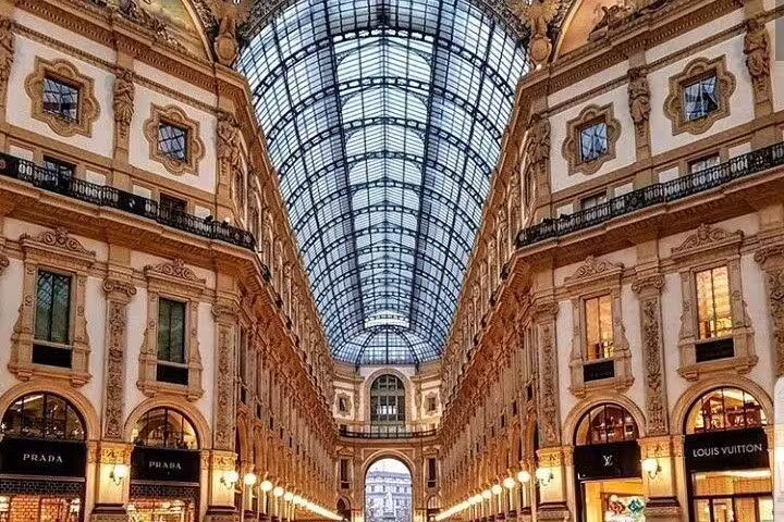 Explore Milan's iconic Galleria Vittorio Emanuele II on a private transfer from Malpensa Airport, blending luxury and history.