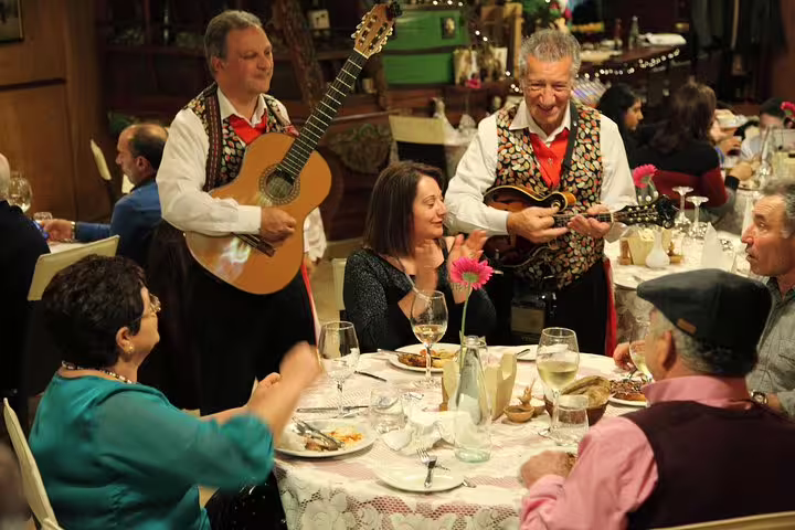 Guests enjoy live traditional music during the Maltese Folklore Night Tour, creating an authentic cultural atmosphere.