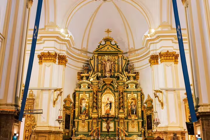 Discover the intricate altar of Marbella's historic church, a highlight on the Old Town private walking tour.