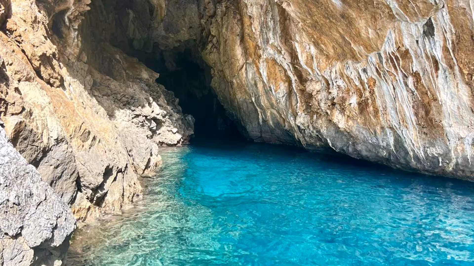 Explore the stunning azure waters and rocky formations of Baia Infreschi on a Marina di Camerota boat tour.