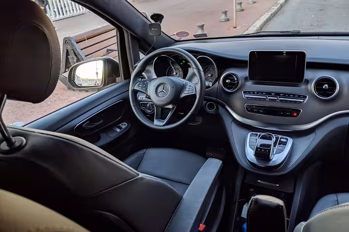 Modern chauffeur car cockpit for Marseille airport, port, hotel and train station transfer with private driver service