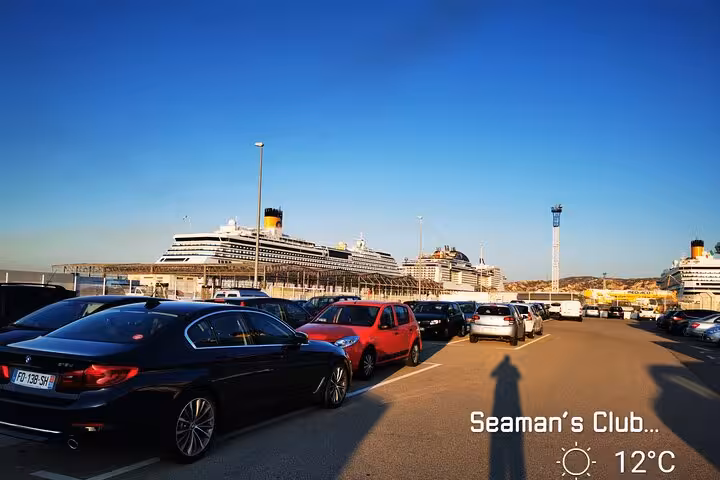 Cars at Marseille cruise terminal near docked ship, ideal for private transfer to Marseille Provence Airport