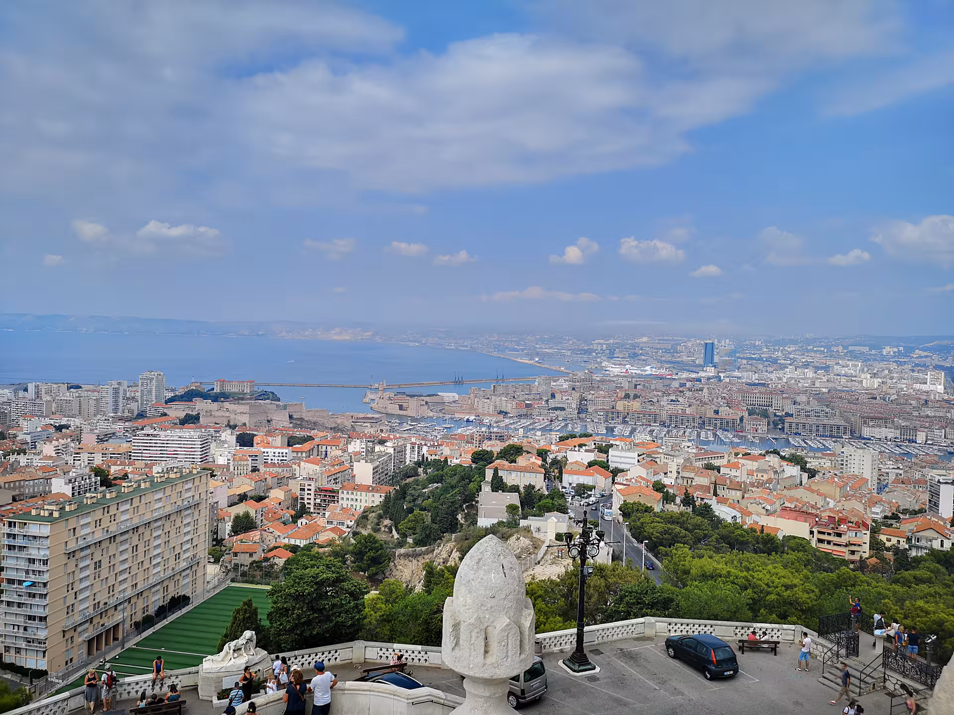 Panoramic view over Marseille Old Port and Mediterranean coast from Notre-Dame de la Garde viewpoint