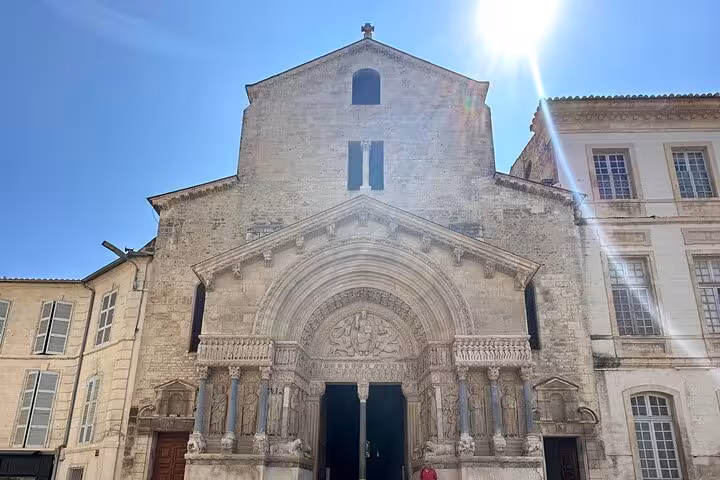 Romanesque church facade in Arles old town, visited on private Marseille shore excursion to Provence villages