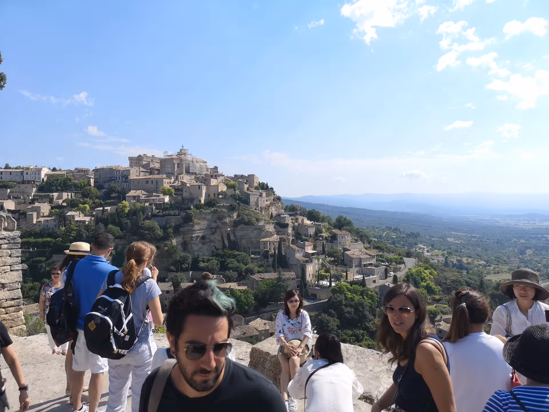 Tourists at Gordes viewpoint on a private Marseille shore excursion to Luberon hilltop villages, Provence