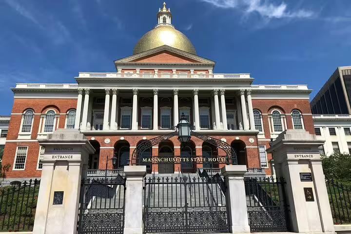 Massachusetts State House with gold dome and brick facade, Boston historic landmark