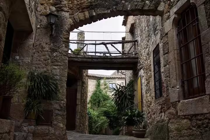 Stroll through charming stone alleyways and rustic arches on the all-inclusive Three Medieval Gems private tour.