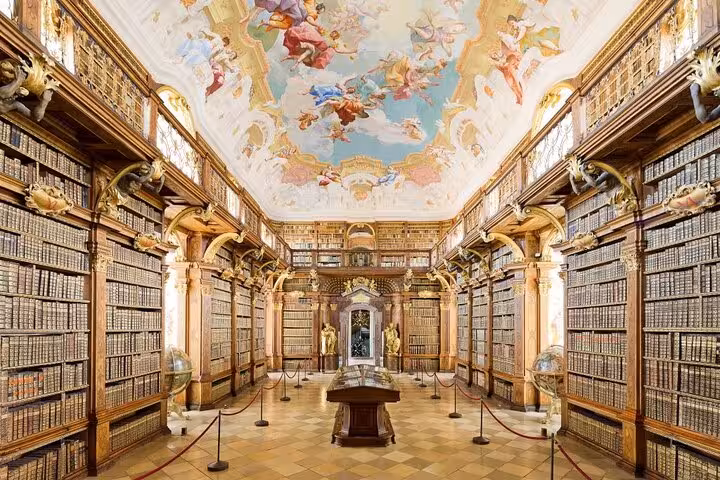 Melk Abbey library interior with frescoed ceiling and historic shelves on Wachau private tour from Vienna