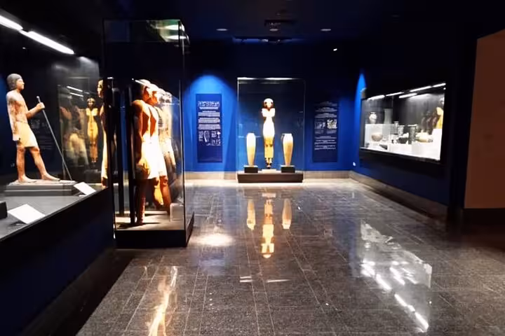 Memphis museum gallery showcasing ancient Egyptian statues and artifacts, Saqqara pyramids tour with lunch