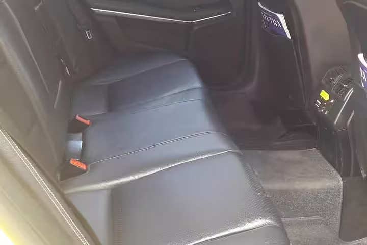 Spacious Mercedes rear leather seats for private transfer from Delphi to Athens, Greece, with premium comfort