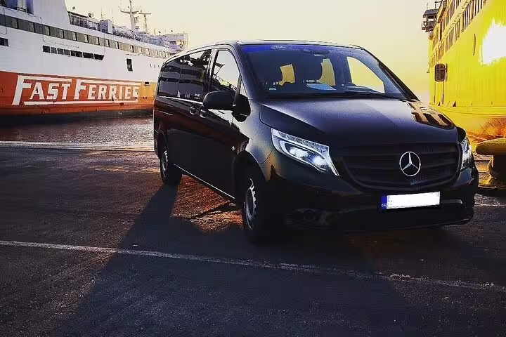 Mercedes V-Class minivan at ferry port for private transfer from Lefkada to Athens, spacious group transport
