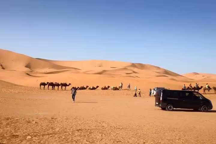 Merzouga Sahara dunes with camel caravan and 4x4 on 3-day private desert tour from Marrakech to Fes
