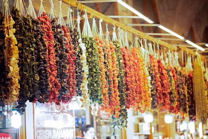 Colorful dried peppers and eggplants hanging in a Mesopotamia bazaar on a 10-day private guided tour