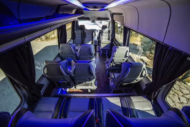 Luxury minibus interior for Meteora full-day private tour from Athens with comfortable seats and AC