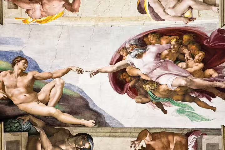 Close-up of Michelangelo’s Creation of Adam fresco on the Sistine Chapel ceiling during Vatican Museums private family tour