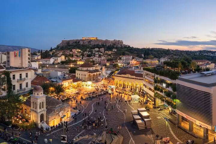 Panoramic Monastiraki Square at twilight with Acropolis lit up, Athens by Night walking tour city views