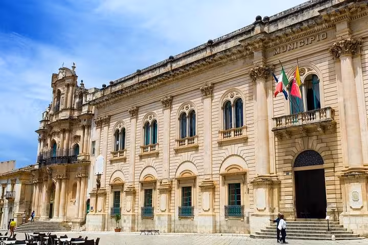 Historic municipal building in Scicli, a filming location for Il Commissario Montalbano, showcasing Baroque architecture.