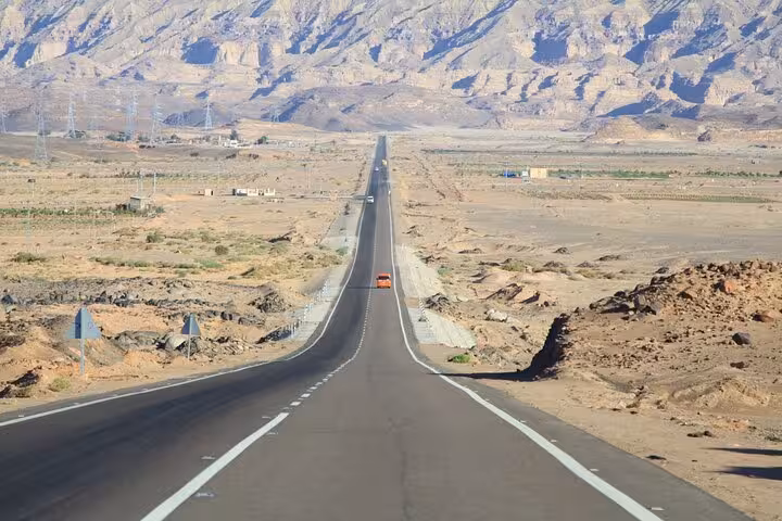 Desert highway to Saint Catherine, Sinai Mountains route for St Catherine Mountain climbing adventure from Sharm