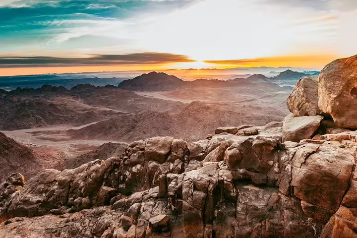 Sunrise view from Mount Sinai summit on the Dahab hiking tour to Saint Catherine Monastery, Sinai mountains
