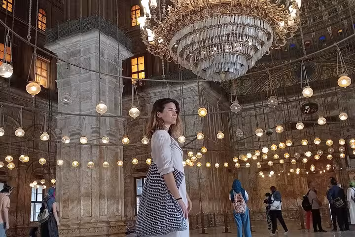 Visitor inside Muhammad Ali Mosque at Cairo Citadel, part of private Grand Museum and Khan El Khalili tour
