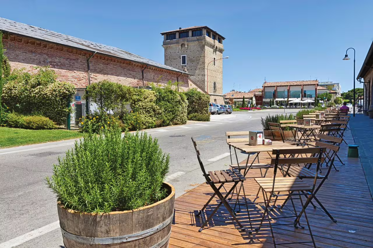 Outdoor seating area near the Museum of Salt with scenic views of historic architecture and greenery.